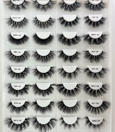 A set of 20 pairs of luxurious false eyelashes in various styles, presented in a sleek white case, perfect for enhancing your natural beauty.
