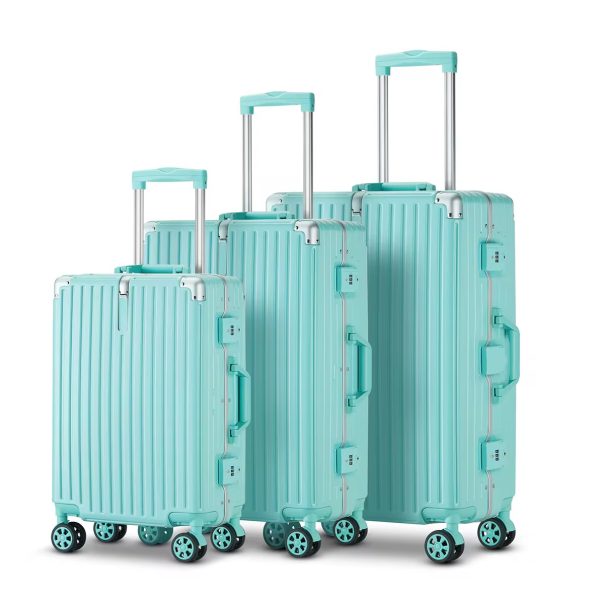 A set of three turquoise suitcases with telescopic handles and wheels, perfect for luxurious travel experiences.