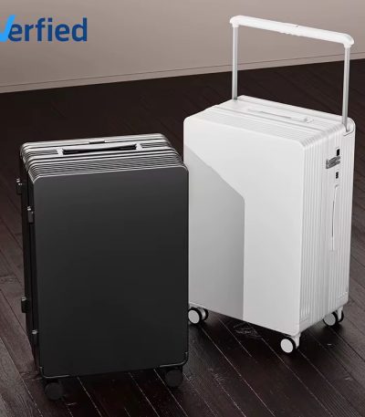 Two sleek, modern suitcases, one black and one white, with a sturdy handle and smooth-rolling wheels, perfect for the discerning traveler seeking luxury and reliability.