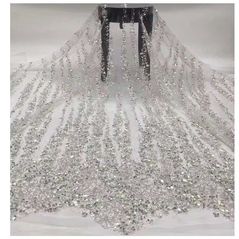 IMG_5653 A luxurious crystal beaded wedding veil with cascading sequins, perfect for adding a touch of glamour to your wedding day look.