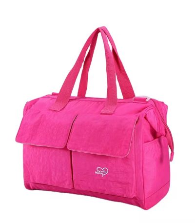 A pink insulated lunch bag with durable handles, perfect for work or school, keeping meals fresh and stylish.