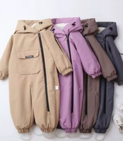 A collection of high-quality, hooded jumpsuits in various colors, laid out neatly with a pair of baby shoes, showcasing comfort and style for kids.