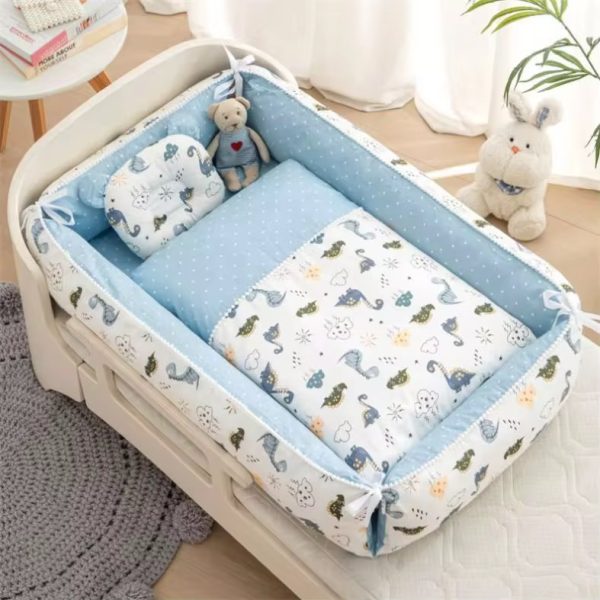 A baby bed with a cartoon animal print bedding set, complete with a comfortable crib liner and soft pillow, in a serene nursery setting.