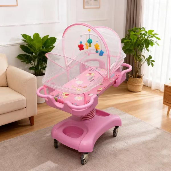 A pink baby crib with mosquito net and mobile in a cozy living room, perfect for a comfortable and safe sleeping space for your baby.