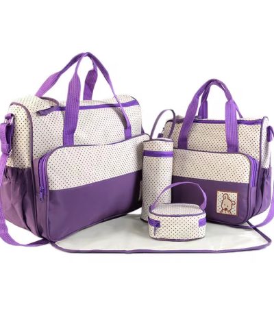 A beautifully arranged 5-piece diaper bag set in a luxurious polka dot and purple design, perfect for the stylish and quality-conscious parent.