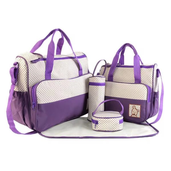 A beautifully arranged 5-piece diaper bag set in a luxurious polka dot and purple design, perfect for the stylish and quality-conscious parent.